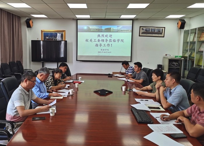 图11：校关工委每学期初走访二级学院协商工作